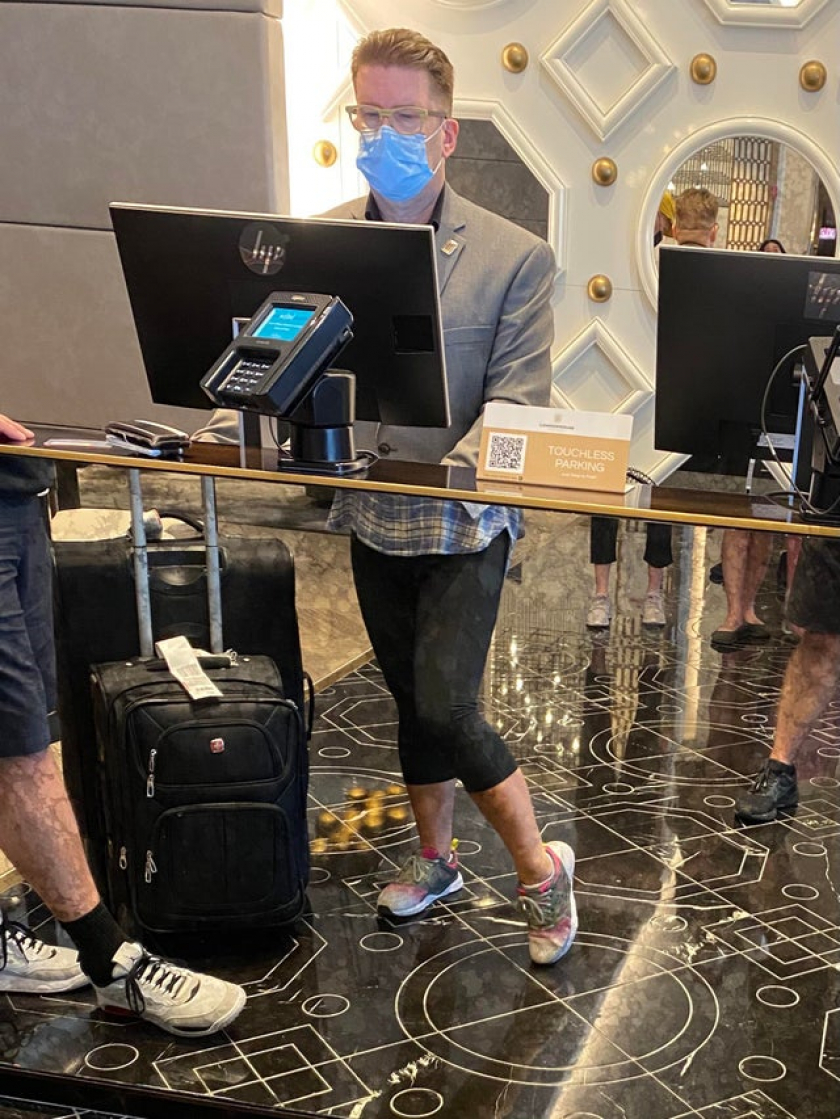 The reflection in the mirror on this hotel check in desk