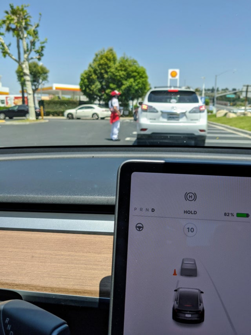 My car thinks the drive thru attendant is a cone.