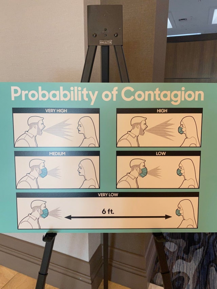 This aggressive social distancing sign at my hotel.