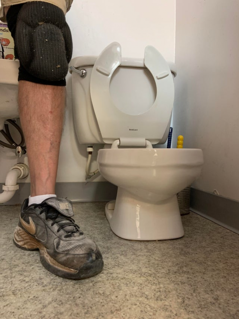 I'm not a giant , I'm just installing new flooring at a pre-school