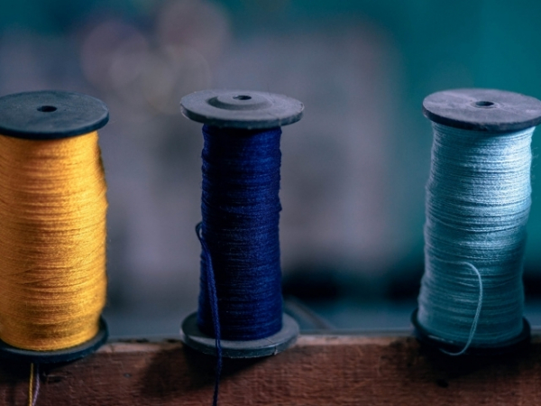 Could you sew a button back onto a shirt?