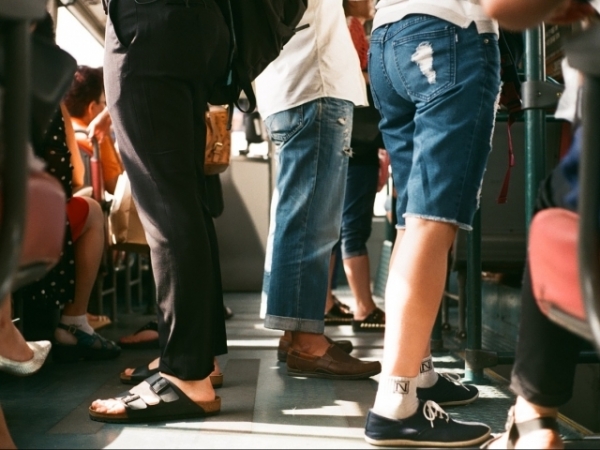 You've started to bump into a new colleague on the train to work every morning. So you...