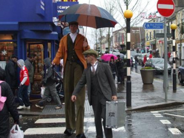 If John is five inches taller than seven feet, how many inches tall is he?