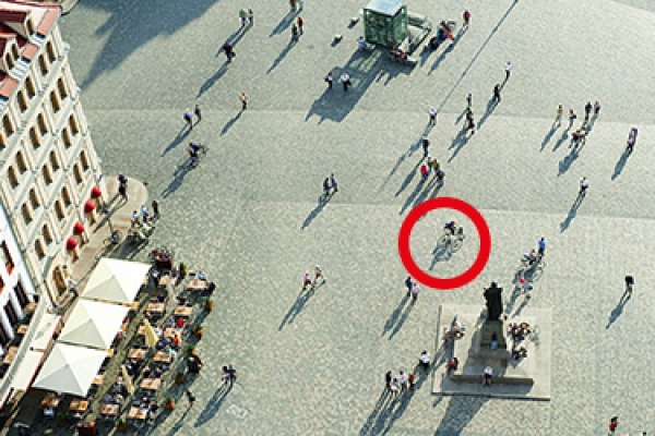 How does the person in the red circle move?