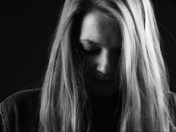 You can tell that a friend is feeling depressed, but they won't let you in. What do you do?