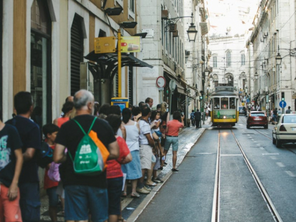 What are you most likely to do while waiting in line?
