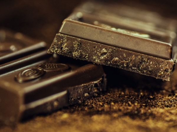 A chocolate bar is sitting two feet away from you. What do you do?