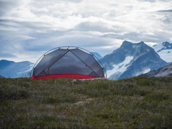 Which is warmer on a winter backpacking trip: a tent or a snowcave?