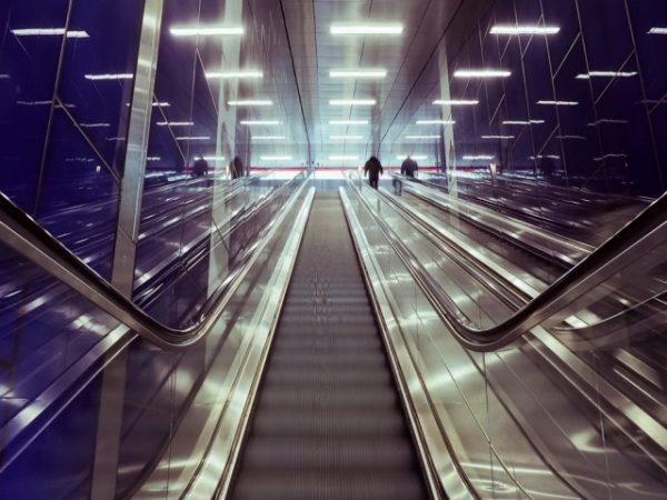 Which of the following is true in regards to escalator etiquette?