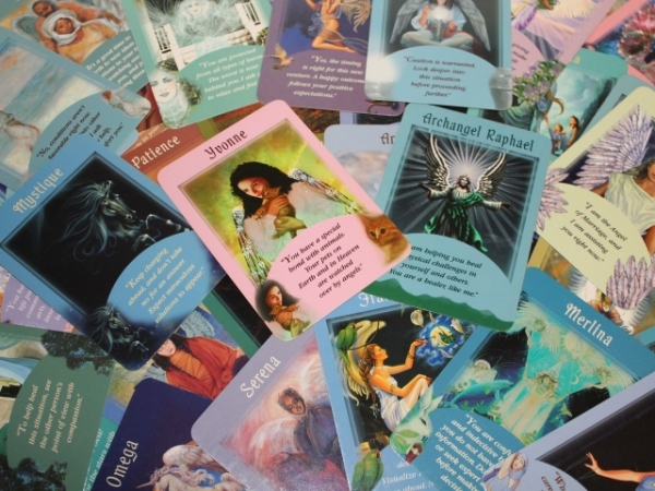 There are three cards lined up in a row. Your first card indicates your recent past. Which card do you want to pick up?