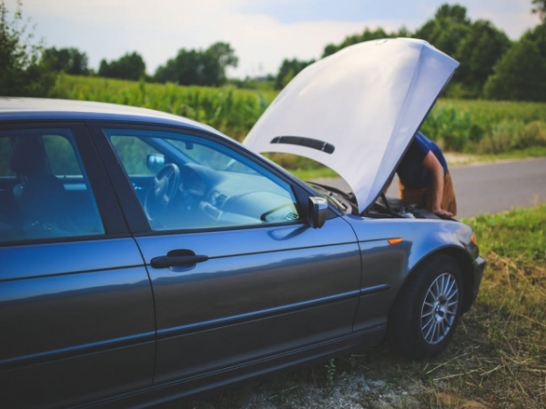 You see a co-worker broken down on the side of the road. What do you do?