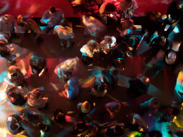 How do you enter a room full of people?