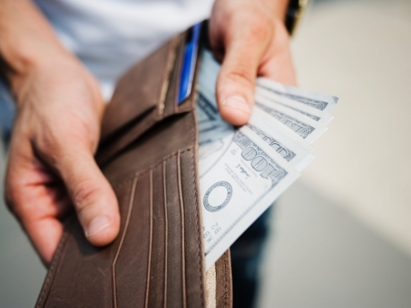 You're on your way home when you spot a wallet. What do you do?