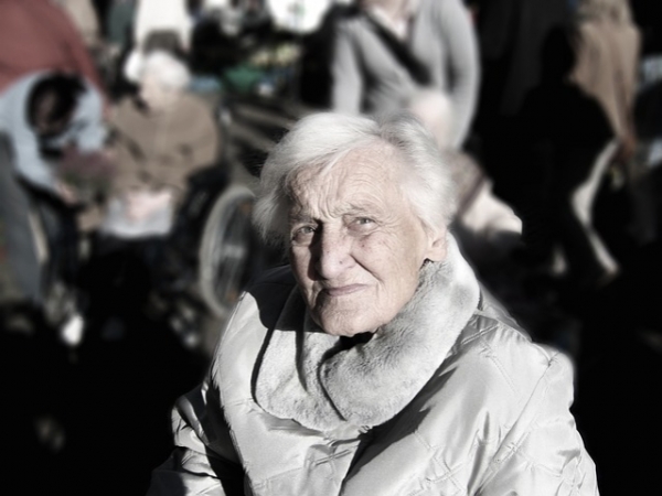 If you see an old woman who needs help loading groceries into her car, what do you do?