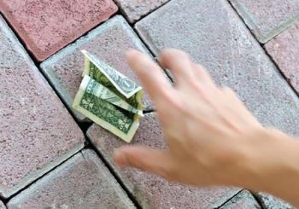 Keeping money you found in the street is...