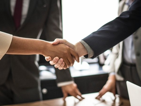 The first thing you do when you meet someone new is?