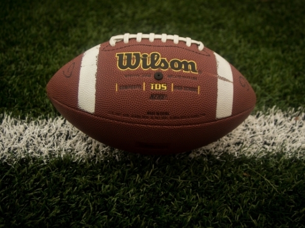 Your partner is a football fanatic and tomorrow is the big game. What do you do?