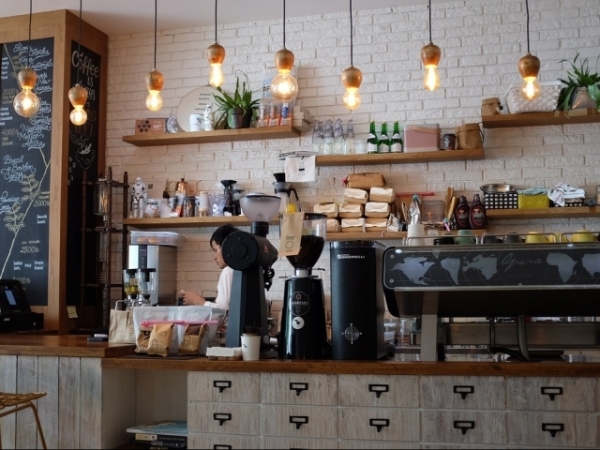 You meet a friend at a coffee shop and the line is extremely long. What do you do?