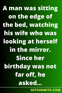 A man was sitting on the edge of the bed, watching his wife